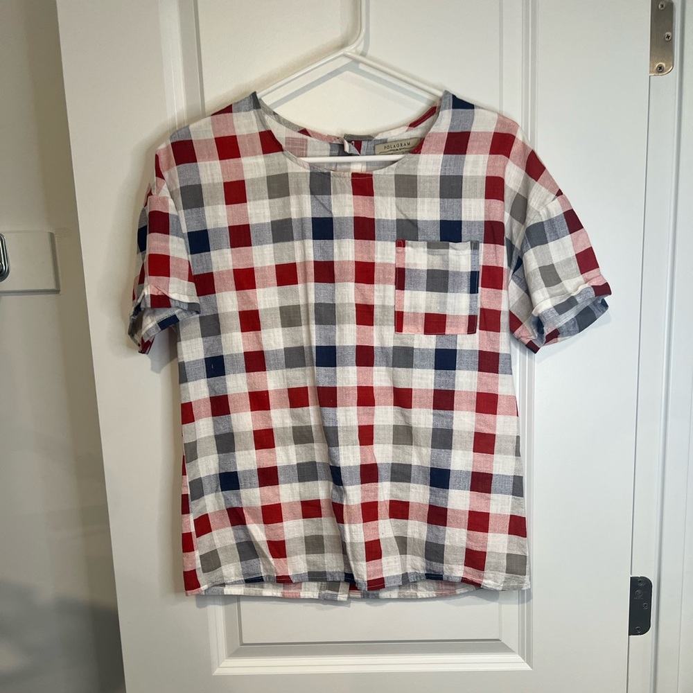 Red white and blue plaid blouse. Size small button up back.